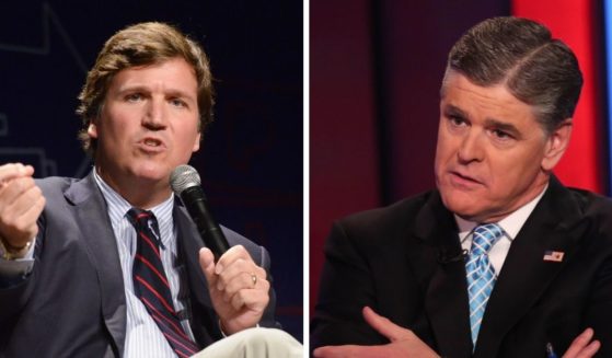 Fox News hosts Tucker Carlson, right; and Sean Hannity, left.
