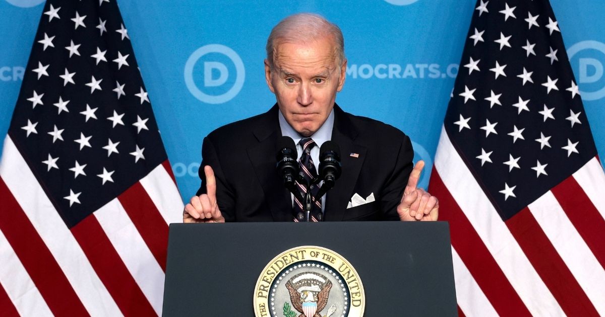 President Joe Biden gestures as he gives remarks at the Democratic National Committee’s winter meeting at the Washington Hilton Hotel on Thursday in the nation's capital.