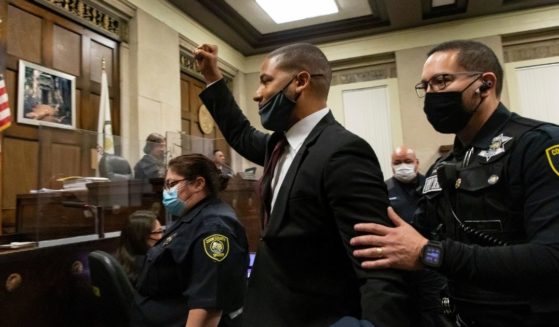Actor Jussie Smollett is led out of a Chicago courtroom after being sentenced on March 10, 2022.