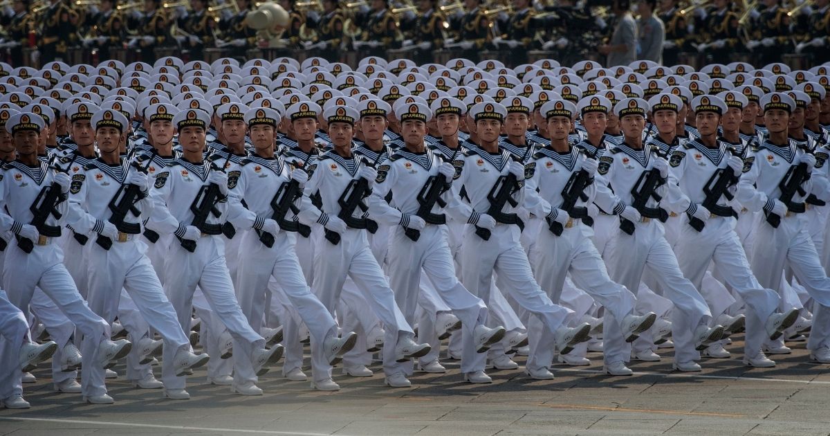 Chinese sailors march in formation through Beijing during 2019 ceremonies marking the 70th anniversary of the founding of the People's Republic of China in 1949.