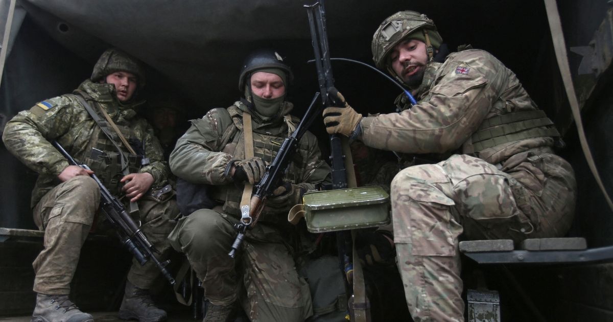 Ukrainian soldiers prepare for battle with Russian troops and Russia-backed separatists in eastern Ukraine in early March.