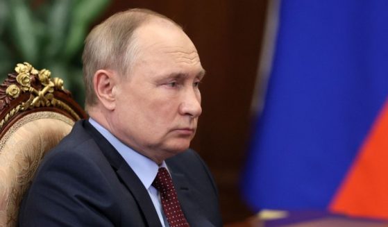 Russian President Vladimir Putin attends a meeting at the Kremlin in Moscow on Wednesday.