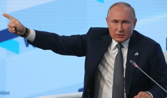 Russian President Vladimir Putin gestures during a speech in Sochi on Oct. 21.
