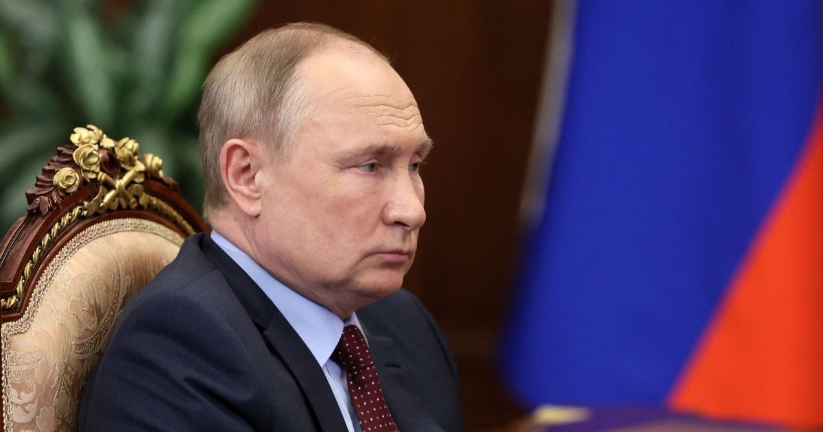 Russian President Vladimir Putin looks on during a meeting at the Kremlin in Moscow on March 2.