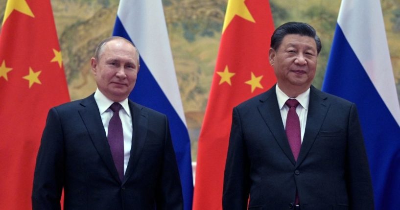 Russian President Vladimir Putin, left, and Chinese President Xi Jinping pose during a meeting in Beijing on Feb. 4.