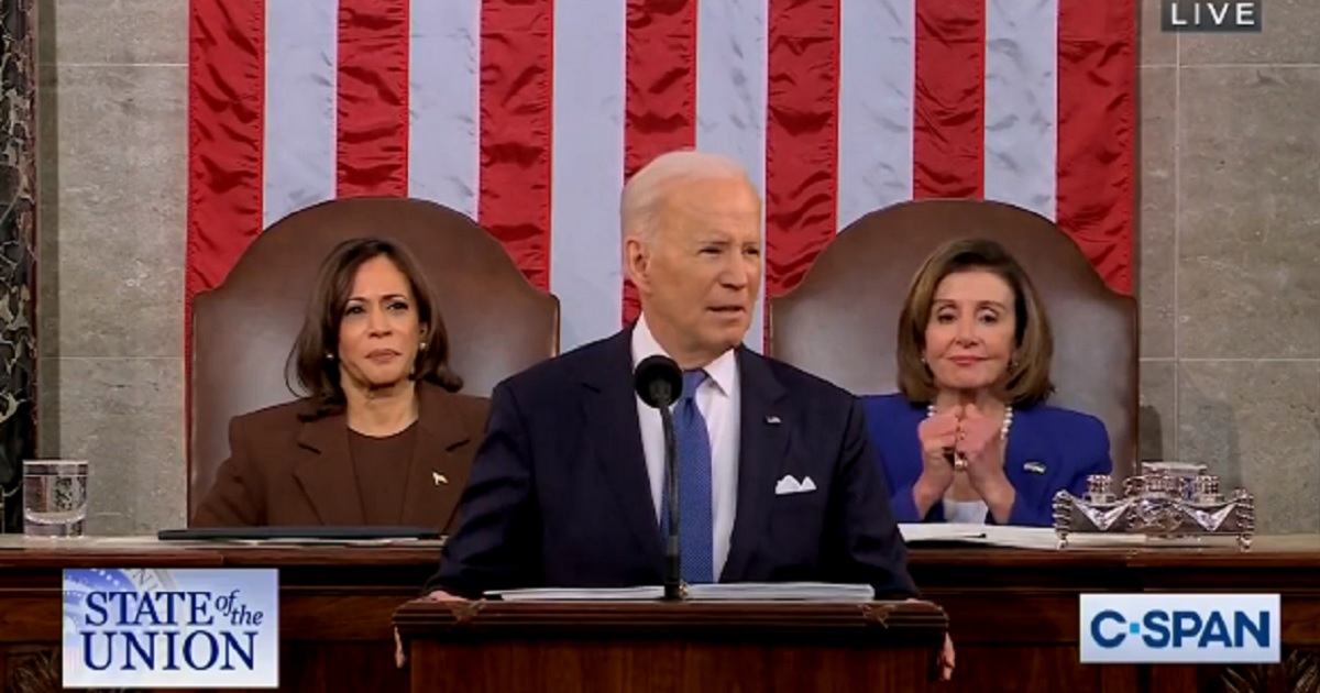 President Joe Biden delivers Tuesday's State of the Union address as House Speaker Nancy Pelosi prepares to rub her fists in the background.