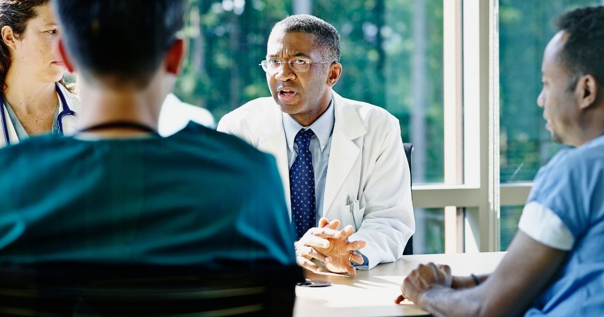 A group of doctors is seen in the above stock image.