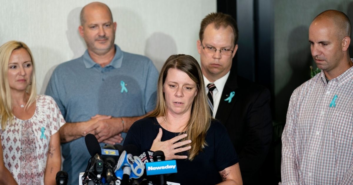 The family of Gabby Petitio - from left to right Tara Petitio, Joseph Petito, Nicole Schimdt and Jim Schimdt - with help from attorney Richard Stafford, second from right, are suing the family of Brian Laundrie.