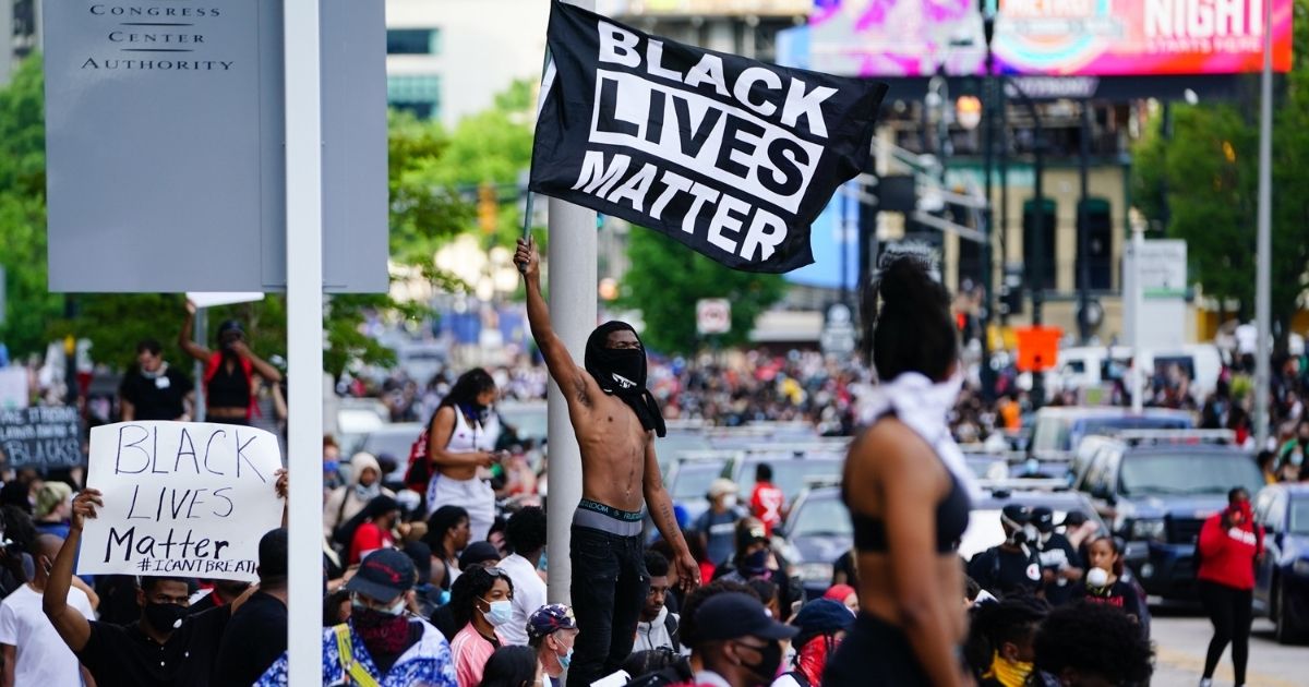 A man waves a Black Lives Matter flag during a protest in Atlanta on May 29, 2020.