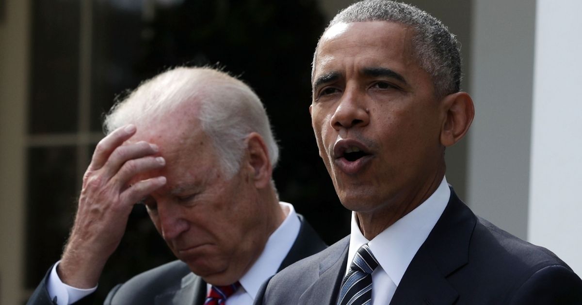 Then-President Barack Obama speaks alongside his vice president, Joe Biden, in the Rose Garden of the White House in Washington on Nov. 9, 2016.