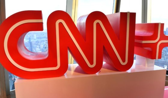 A sign with the CNN+ logo is displayed for the launch event in New York City on March 28.