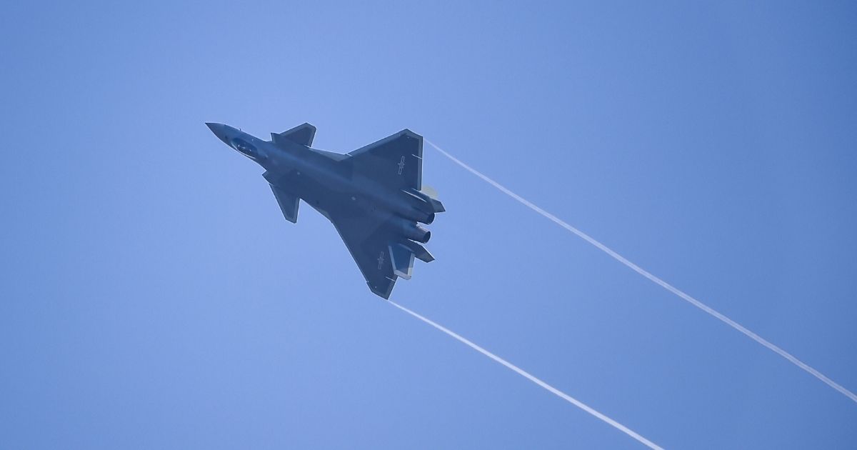 A Chinese J-20 jet performs at Zhuhai Air Show