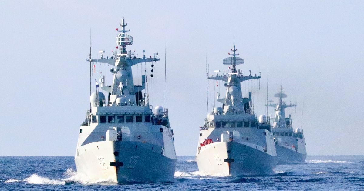 Three guided-missile frigates attached to the frigate flotilla of a navy base under the People's Liberation Army Southern Theater Command steam in formation during a training exercise in waters of the South China Sea on Jan. 4, 2021.