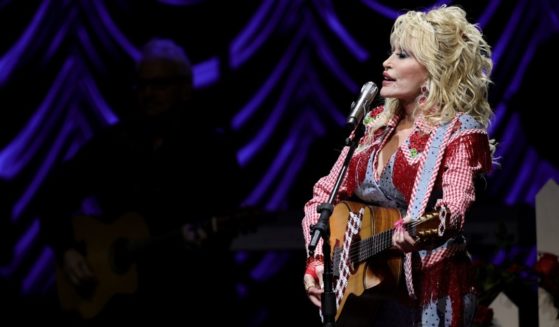 Dolly Parton is seen performing March 18 in Austin, Texas. Parton's childhood home is being offered as a wedding venue for those whose previous plans were ruined by a recent wildfire in Tennessee