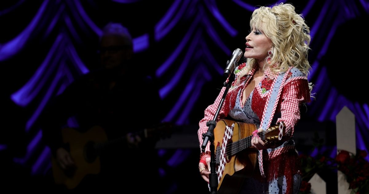 Dolly Parton is seen performing March 18 in Austin, Texas. Parton's childhood home is being offered as a wedding venue for those whose previous plans were ruined by a recent wildfire in Tennessee