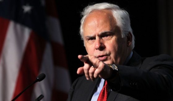 FedEx CEO Frederick Smith is seen speaking at a Washington event in a file photo from May 2012. In a Fox News interview Wednesday, Smith traced the current record-level inflation to several disastrous Democratic policies.