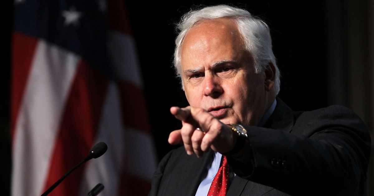 FedEx CEO Frederick Smith is seen speaking at a Washington event in a file photo from May 2012. In a Fox News interview Wednesday, Smith traced the current record-level inflation to several disastrous Democratic policies.