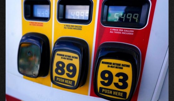 Gasoline prices are displayed at a gas station in Vernon Hills, Ill., Friday, April 1.