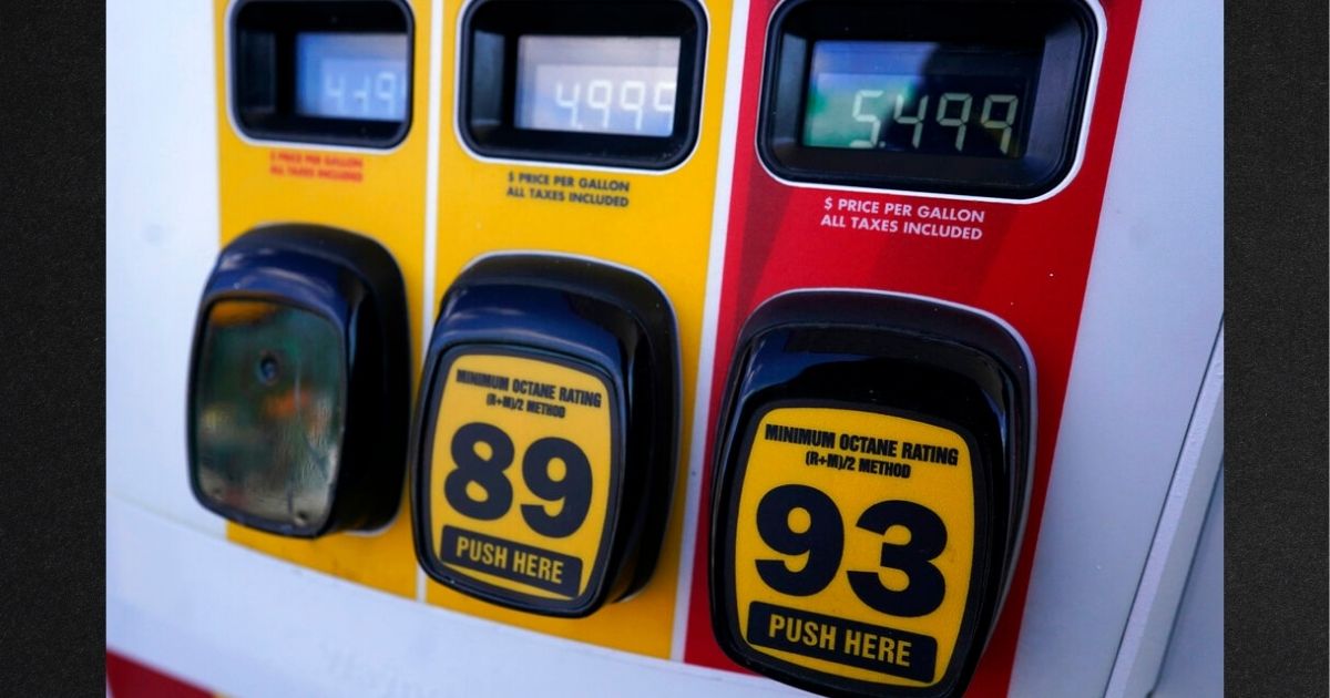 Gasoline prices are displayed at a gas station in Vernon Hills, Ill., Friday, April 1.