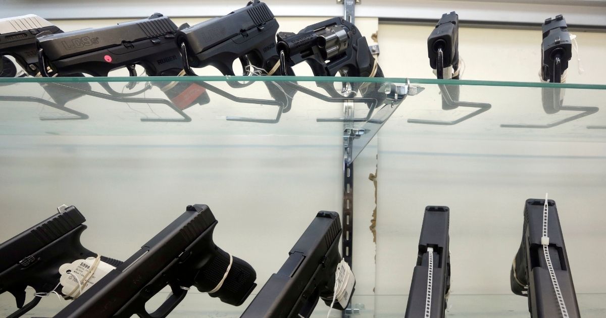 Handguns are displayed at a firearms store in Miami on June 29, 2016.