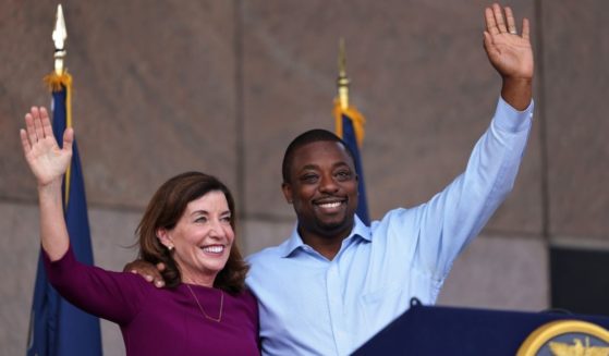 New York Gov. Kathy Hochul and Brian Benjamin wave during a news conference announcing him as her lieutenant governor in New York City on Aug. 26.