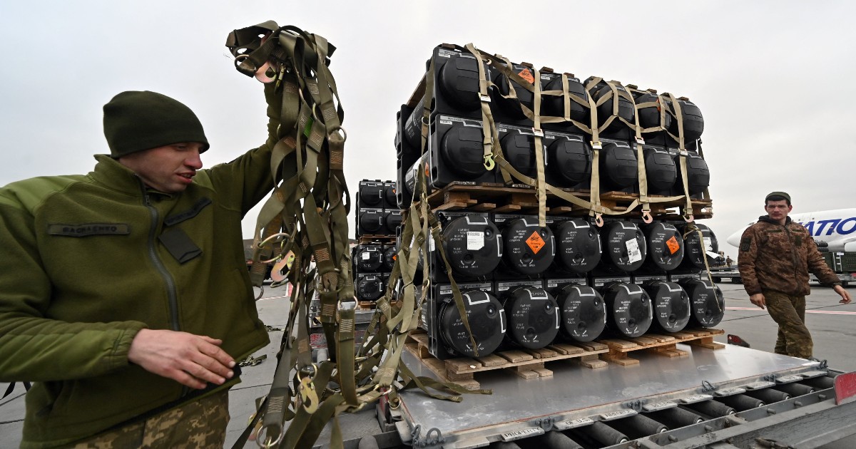 Ukrainian servicemen unload anti-tank Javelin missiles provided by the U.S. to Ukraine on Feb. 11 in Kyiv.