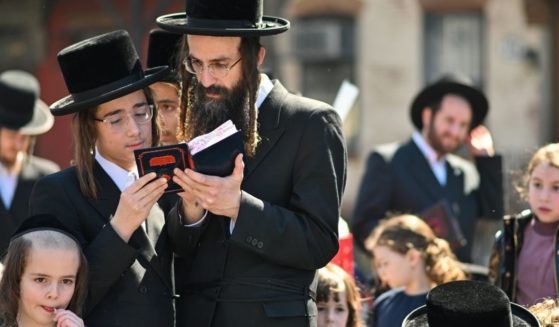 Orthodox Jews pray before the Passover in Williamsburg on Friday in the Brooklyn borough of New York City.