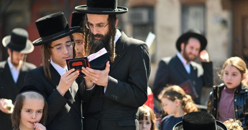Orthodox Jews pray before the Passover in Williamsburg on Friday in the Brooklyn borough of New York City.