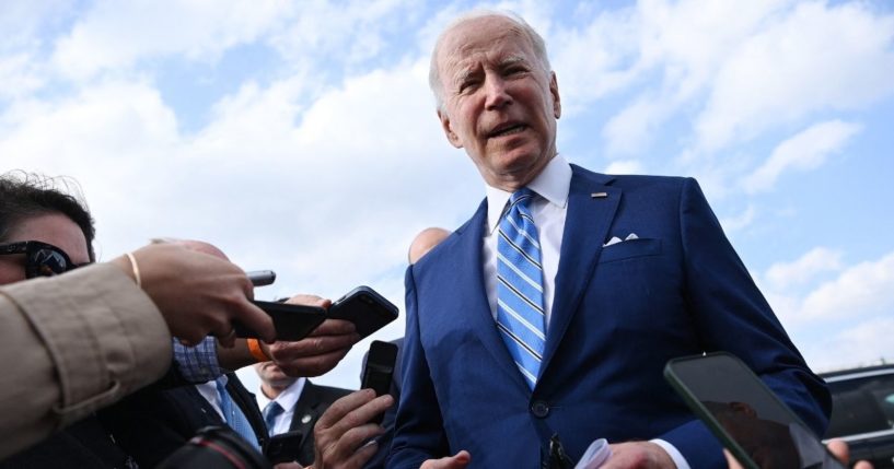 President Joe Biden speaks to members of the media at Des Moines International Airport in Des Moines, Iowa, on Tuesday.