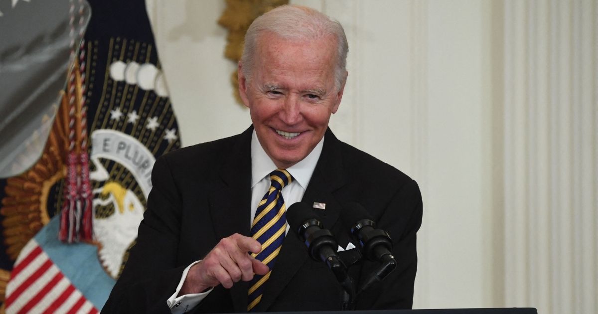 President Joe Biden points to the audience while speaking during a ceremony honoring the Council of Chief State School Officers 2022 National and State Teachers of the Year at the White House on Wednesday.