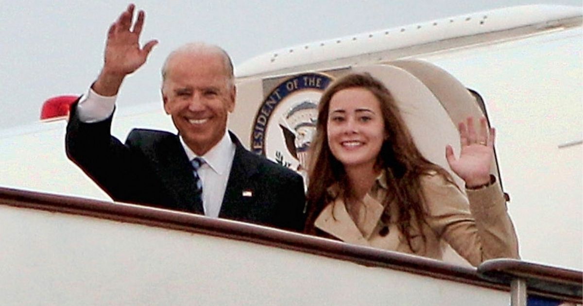 Then-Vice President Joe Biden, left, and granddaughter Naomi, right, step off of Air Force Two after arriving in Beijing, China, on Aug. 17, 2011. Naomi will have her wedding reception at the White House this year.