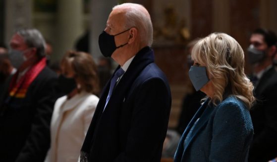 President Joe Biden and first lady Jill Biden celebrate Mass at the Cathedral of St. Matthew the Apostle in Washington on Jan. 20, 2021.
