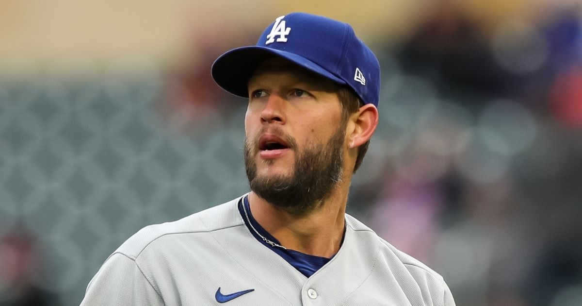 Clayton Kershaw of the Los Angeles Dodgers walks to the dugout after recording a strikeout against Nick Gordon of the Minnesota Twins to end the sixth inning at Target Field in Minneapolis on Wednesday.