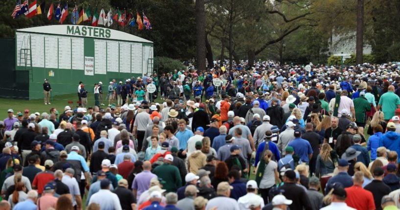 Spectators are seen during the Masters at Augusta National Golf Club on Tuesday in Augusta, Georgia.