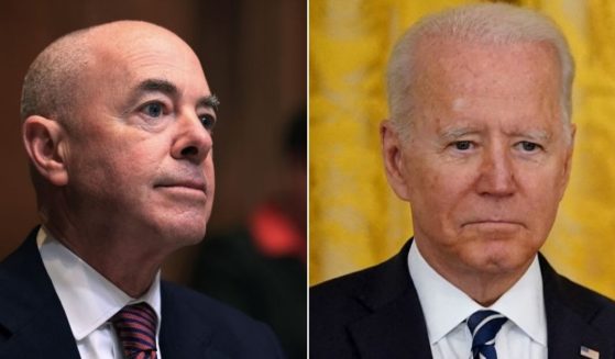 Homeland Security Secretary Alejandro Mayorkas, left, is being accused by Republicans of having "willingly endangered Americans citizens and undermined the rule of law" while serving in the administration of President Joe Biden, right.