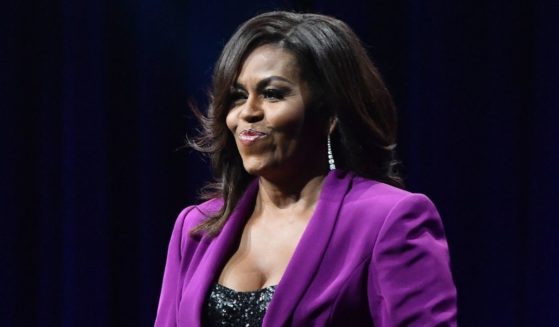Former first lady Michelle Obama is on stage for "Becoming: An Intimate Conversation with Michelle Obama" at State Farm Arena in Atlanta on May 11, 2019.