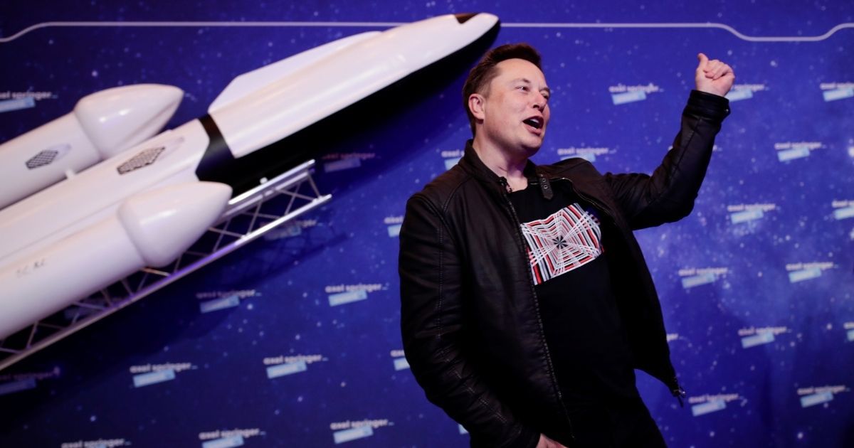 SpaceX and Tesla CEO Elon Musk gestures during the Axel Springer Awards ceremony in Berlin on Dec. 1, 2020.