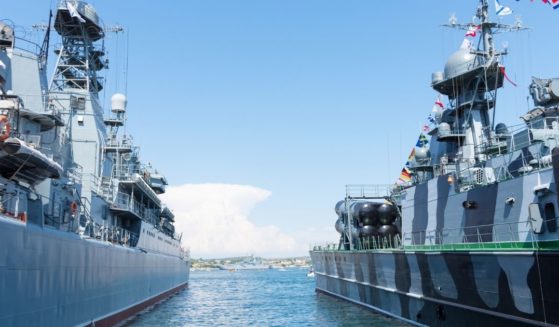 Russian warships sit at a pier in Sevastopol, Crimea.