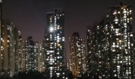 Video taken in Shanghai, China, on Thursday, shows citizens of the city opening their windows to scream after enduring another week of total COVID-19 lockdowns.