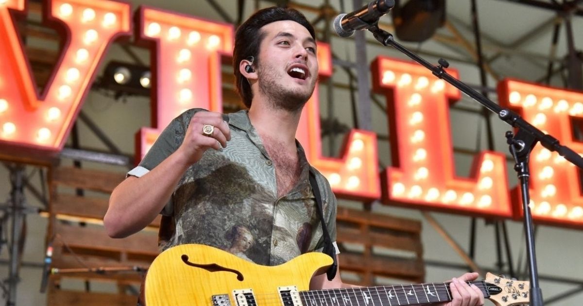 Laine Hardy, seen performing in July of 2021, turned himself in to Louisiana State University police Friday, admitting that there was a warrant out for his arrest.
