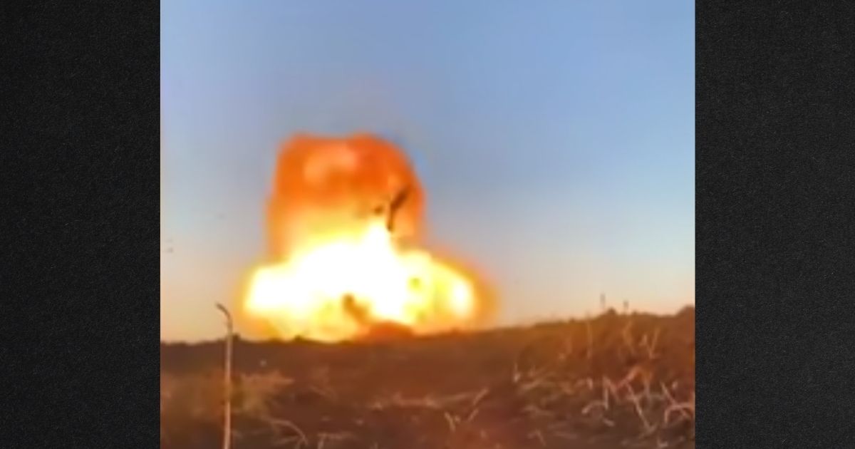 A video shared online shows a Russian tank - stationary and likely abandoned - being blown up.
