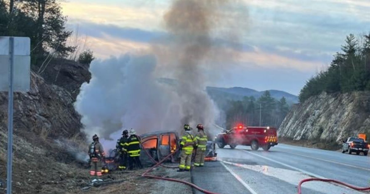 Two teenage boys rescued a man from this truck, which had crashing into a rock ledge, just moments before the truck burst into flames near Nelson, New Hampshire.