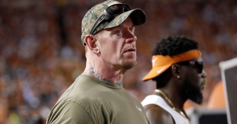 WWE legend The Undertaker watches from the sideline during a game at Darrell K Royal-Texas Memorial Stadium on Sept. 7, 2019, in Austin, Texas.