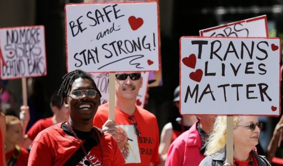 A group of marchers with the transgender group TGI Justice display signs during the San Francisco Gay Pride parade on June 29, 2014.