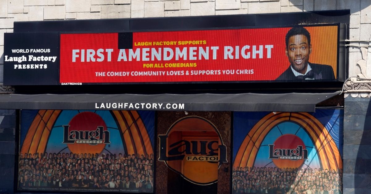 A message expressing support for comedian Chris Rock is displayed on the digital marquee of the Laugh Factory comedy club on Wednesday in Los Angeles.
