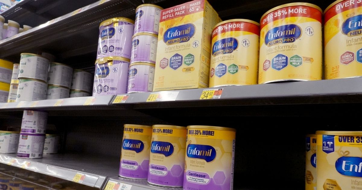Shelves at a Chicago area store show empty spots where baby formula has sold out.