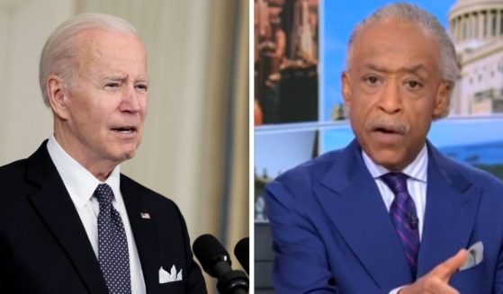 President Joe Biden, left, in a file photo from March, won the office by campaigning as a moderate but has moved increasingly left. That isn't helping him or his party, liberal MSNBC host Al Sharpton, right, said Monday.