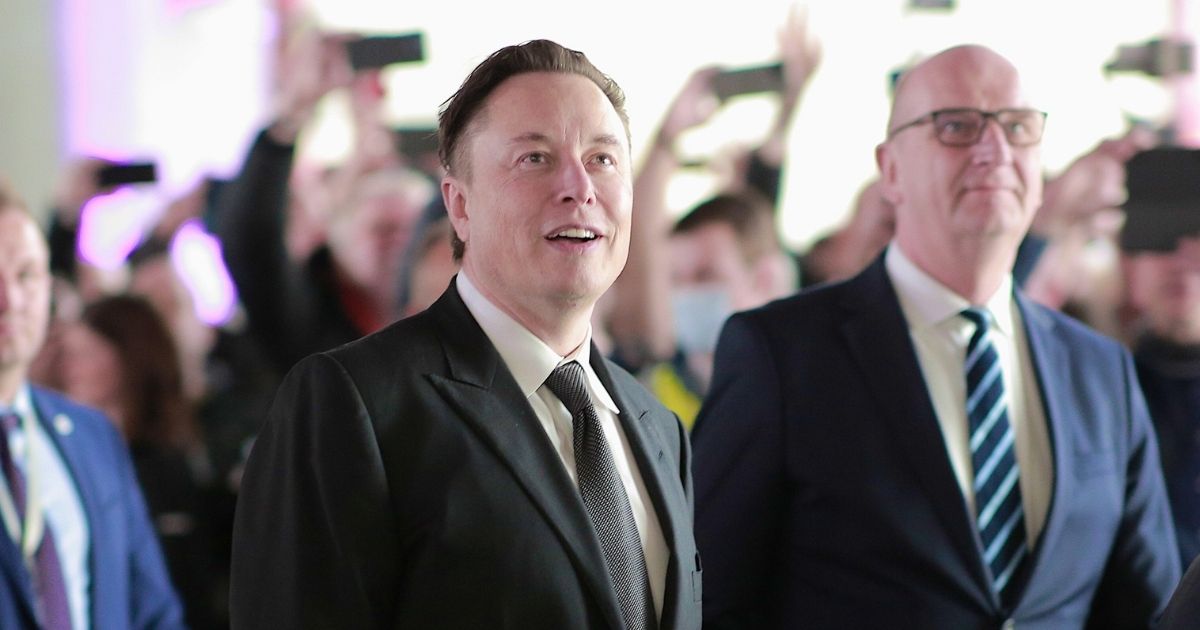 Tesla CEO Elon Musk, pictured in a file photo from March 22 in Gruenheide, Germany, with German Chancellor Olaf Scholz.