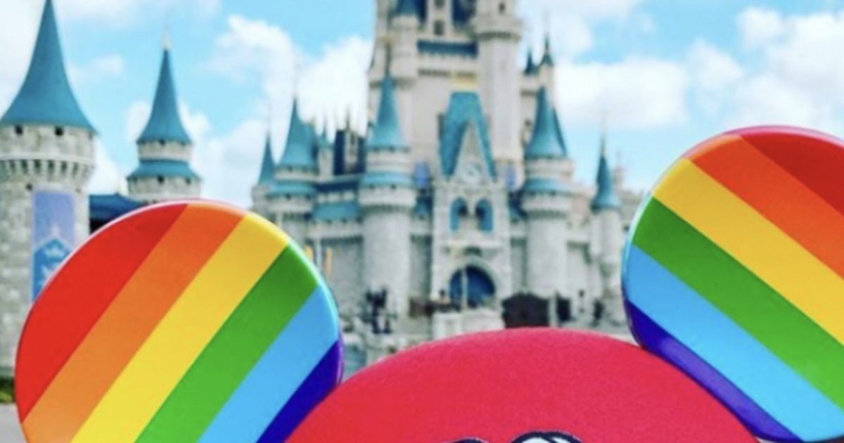 A pair of Mickey Mouse ears that demonstrate support for the LGBTQ+ movement are pictured in front of Cinderella's Castle at Magic Kingdom in Orlando, Florida.