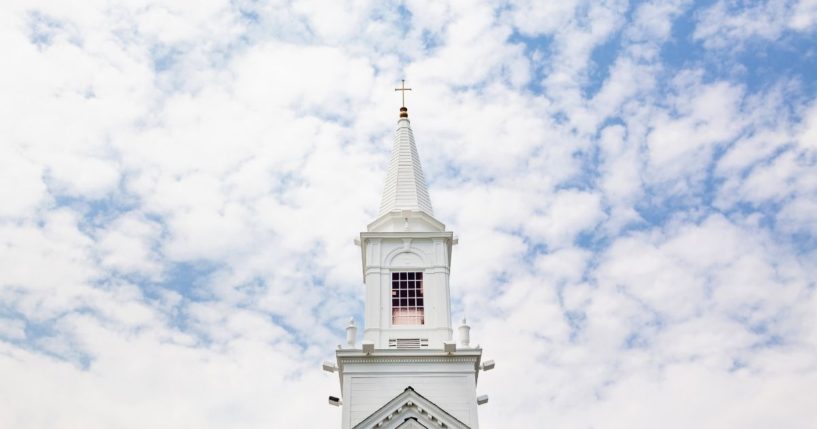 A church steeple is seen in this stock image.